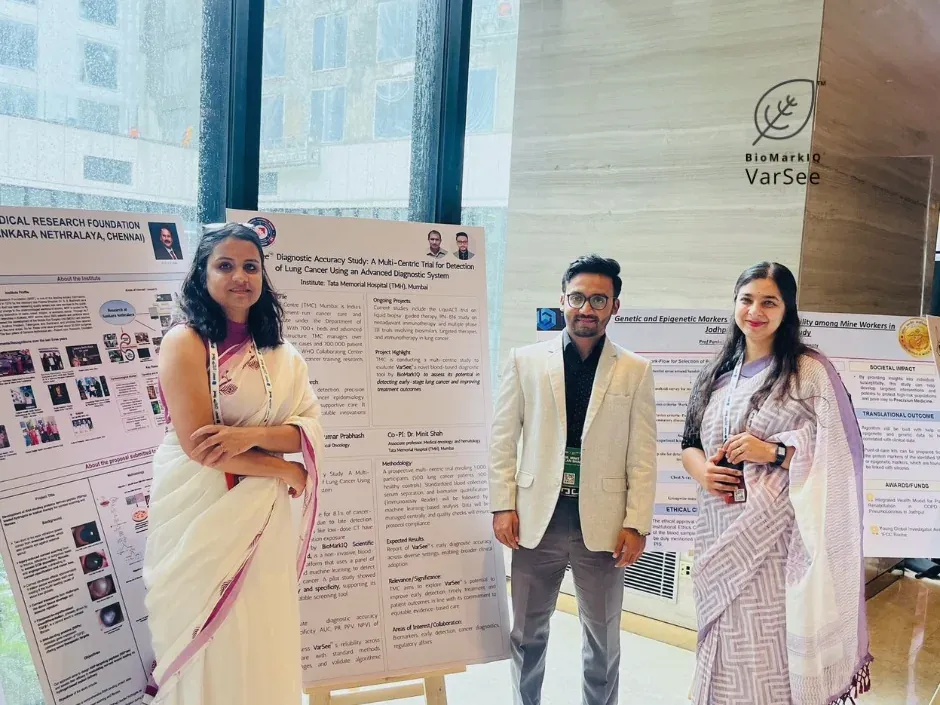 Manasi Khasnis and two others beside a poster for the multicentric VarSee diagnostic accuracy study at Tata Memorial Hospital, Mumbai.