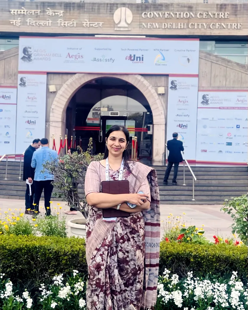 A BioMarkIQ team member outside the Aegis Graham Bell Awards venue at the Convention Centre, New Delhi City Centre.