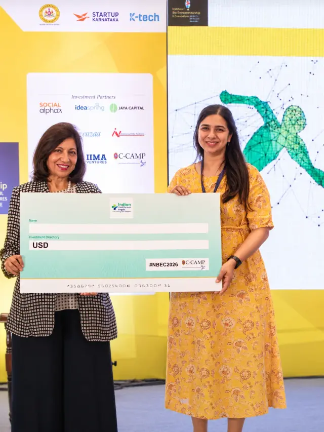Manasi Khasnis at NBEC 2026 with the Indian Healthcare Angels investment-opportunity presentation.
